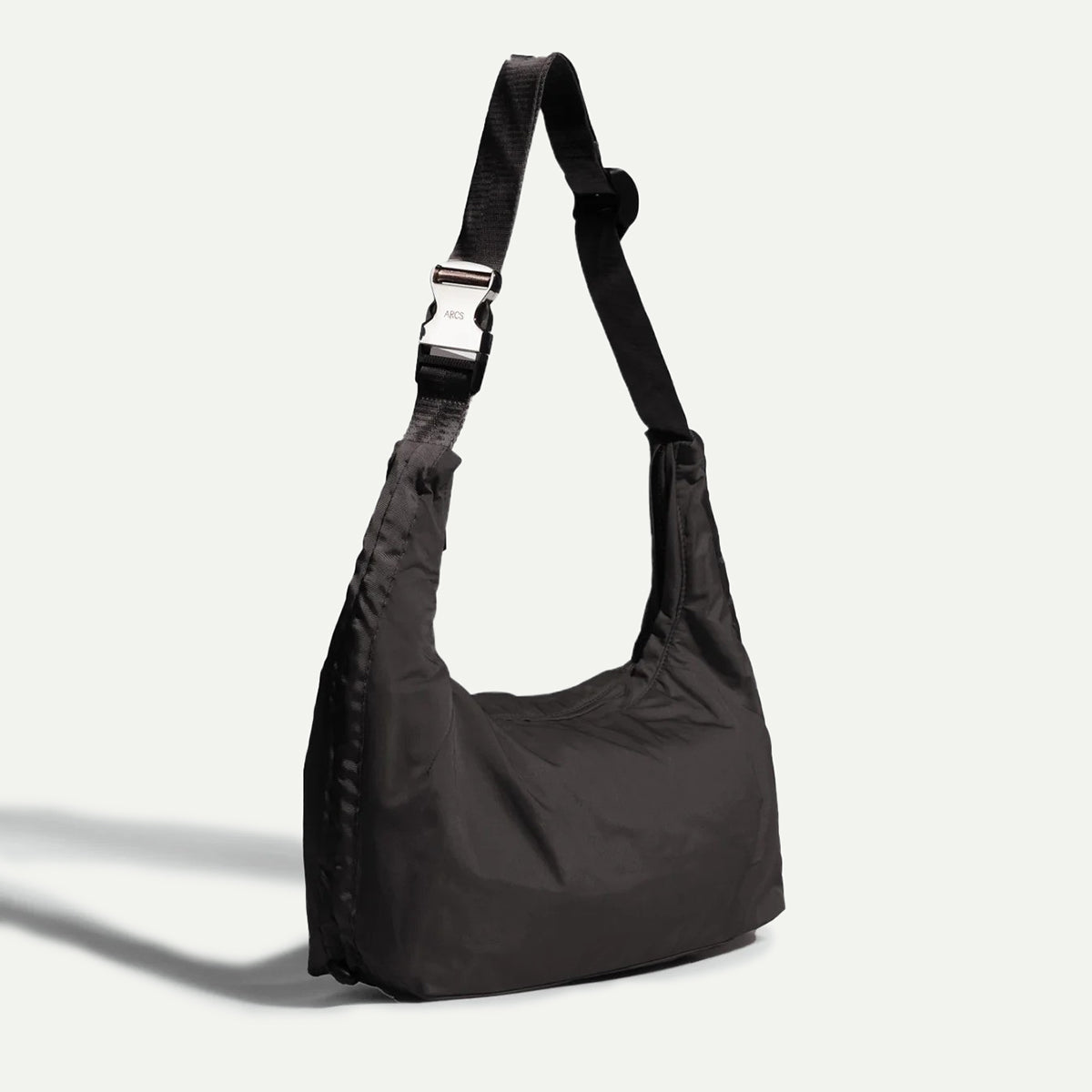 Arcs Black Little Hey Sling Bag
